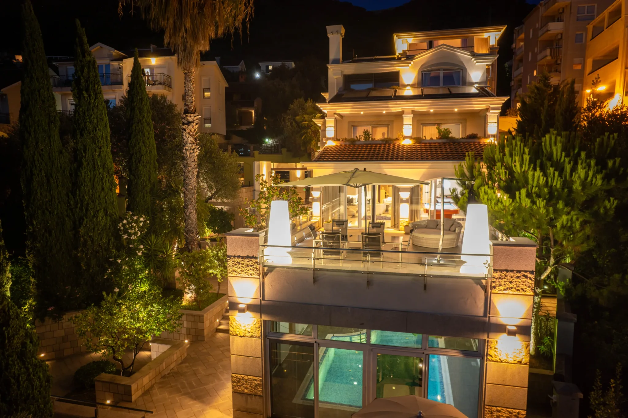 Villa Antares exterior illuminated at night